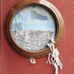cuadro hecho con restos textiles
